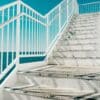 Outdoors staircase looking up. Article title: Markets Reach Record Highs