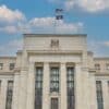 Fed building. Article title: Markets Eyeing Fed for Potential September Rate Cut